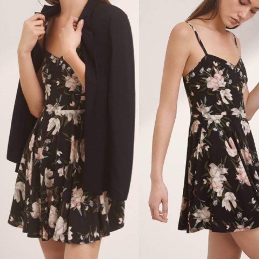 Aritzia Black floral A line mini dress with sweetheart neckline.